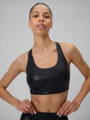 4F Biustonosz do jogi z niskim wsparciem damski - czarny XS. Czarne biustonosze sportowe damskie 4f, bez wzorów, z gumy. Za 129.99 zł.