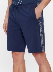 Guess Szorty materiałowe Arlo Z2YD02 K6ZS1 Granatowy Loose Fit. Niebieskie szorty męskie Guess, z aplikacjami, z bawełny. Za 169.99 zł.