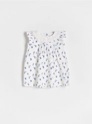 Sukienka we wzór - złamana biel. Sukienki dziewczęce Reserved, bez wzorów, z bawełny, bez ramiączek. W wyprzedaży za 19.99 zł.