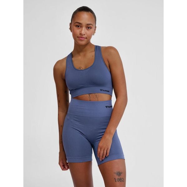 Bezszwowy biustonosz dla kobiet Hummel TIF. Niebieskie biustonosze sportowe damskie HUMMEL, bez wzorów. Za 166.00 zł.