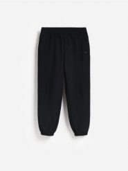 Spodnie jogger z polarem - czarny. Czarne spodnie materiałowe męskie Reserved, bez wzorów, z polaru. Za 149.99 zł.