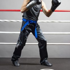 Spodnie Full Contact 500. Czerwone spodnie materiałowe męskie OUTSHOCK, bez wzorów, z elastanu, sportowe. W wyprzedaży za 59.99 zł.