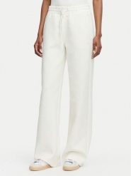 Guess Spodnie dresowe V6YB10 K4295 Kremowy Regular Fit. Białe spodnie dresowe damskie Guess, xl, z aplikacjami, z dresówki. Za 344.99 zł.