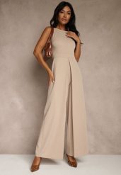 Beżowy Taliowany Kombinezon Ozdobiony Zakładkami Berinola. Brązowe kombinezony damskie Renee, l, bez wzorów, eleganckie, bez kołnierzyka, bez ramiączek. Za 149.99 zł.