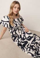 Granatowa Wiskozowa Sukienka z Bufiastymi Rękawami w Abstrakcyjny Wzór Tibee. Niebieskie sukienki damskie Born2be, na co dzień, uniwersalny, bez wzorów, z jeansu, eleganckie, bez kołnierzyka, bez ramiączek, maxi, proste. Za 89.99 zł.