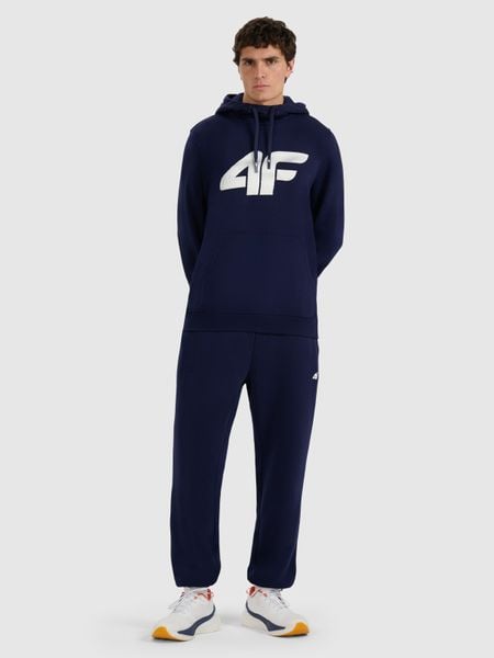 4F Spodnie dresowe joggery męskie - granatowe M. Niebieskie spodnie dresowe męskie 4f, bez wzorów, z bawełny. Za 149.99 zł.