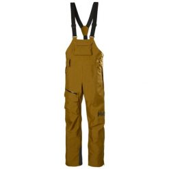 Damskie spodnie narciarskie na szelkach Helly Hansen Powderqueen. Brązowe spodnie materiałowe damskie Helly Hansen, bez wzorów, sportowe. Za 1,338.00 zł.