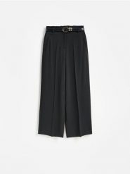 Spodnie wide leg - czarny. Czarne spodnie materiałowe damskie Reserved, bez wzorów, z tkaniny. Za 139.99 zł.