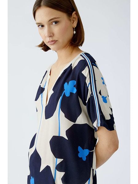 Oui Bluzka w kolorze kremowym rozmiar: 34. Brązowe bluzki damskie Oui, bez wzorów, z wiskozy, bez kołnierzyka, bez ramiączek. Za 121.80 zł.