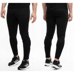 Nike Spodnie męskie Dri-Fit Academy. Spodnie materiałowe męskie Nike, bez wzorów, z bawełny. Za 137.99 zł.