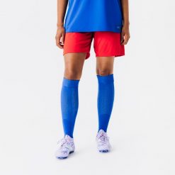 Spodenki piłkarskie Kipsta Essential Club. Czerwone szorty damskie KIPSTA, bez wzorów, z materiału, sportowe. Za 29.99 zł.
