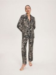 Spodnie z lnem - wielobarwny. Spodnie materiałowe damskie Reserved, bez wzorów, z bawełny. W wyprzedaży za 65.99 zł.