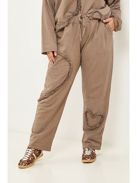 Curvy Lady Spodnie w kolorze beżowym rozmiar: 44/46. Brązowe spodnie materiałowe damskie Curvy Lady, z aplikacjami, z materiału, klasyczne, z standardowym stanem. Za 152.26 zł.