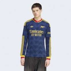 Koszulka wyjazdowa z długim rękawem Arsenal FC 26/27. Niebieskie koszulki męskie z długim rękawem Adidas, l, z dzianiny. Za 479.00 zł.