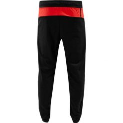 Spodnie dresowe Maroc 2024. Czarne spodnie dresowe męskie Puma, bez wzorów, z dresówki. Za 294.70 zł.