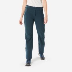 Spodnie turystyczne damskie Quechua SH500 Warm. Niebieskie spodnie dresowe damskie QUECHUA, na zimę, s, bez wzorów, z materiału. Za 249.99 zł.