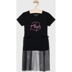 Guess Jeans - T-shirt dziecięcy 118-175 cm. Czarne koszulki dziewczęce Guess Jeans, z aplikacjami, z bawełny, bez ramiączek. Za 129.90 zł.