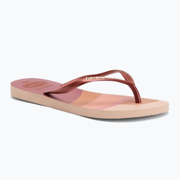 Japonki damskie Havaianas Slim Palette Glow. Czerwone klapki damskie Havaianas, bez wzorów, z materiału, bez obcasa. Za 99.99 zł.