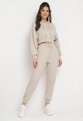Beżowy Komplet Dresowy Bluza z Kapturem i Spodnie Joggery Famiana. Brązowe bluzy z kapturem damskie Born2be, bez wzorów, z dresówki. Za 199.99 zł.