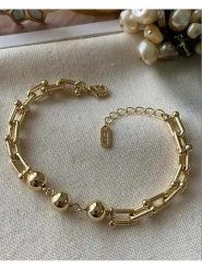 Luseera Pozłacana bransoletka z elementami ozdobnymi rozmiar: onesize. Żółte bransoletki damskie Luseera, pozłacane. Za 43.99 zł.