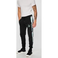 Puma - Spodnie. Czarne spodnie sportowe męskie Puma, z bawełny. W wyprzedaży za 199.90 zł.