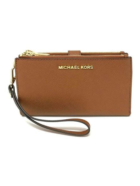Michael Kors Skórzany portfel w kolorze karmelowym - 19 x 14 x 2 cm rozmiar: onesize. Brązowe portfele damskie Michael Kors, bez wzorów, z materiału. Za 482.03 zł.