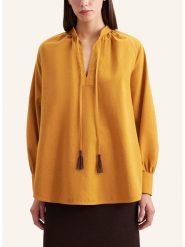 Seidensticker Bluzka w kolorze musztardowym rozmiar: 44. Żółte bluzki damskie Seidensticker, bez wzorów, bez kołnierzyka, bez ramiączek. Za 219.08 zł.