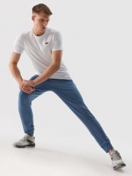 4F Spodnie treningowe szybkoschnące męskie - granatowe 3XL. Niebieskie spodnie sportowe męskie 4f, z dzianiny. W wyprzedaży za 89.99 zł.