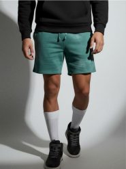 Luźne szorty wiązane w talii - zielony. Zielone szorty męskie Sinsay, bez kołnierzyka. Za 39.99 zł.