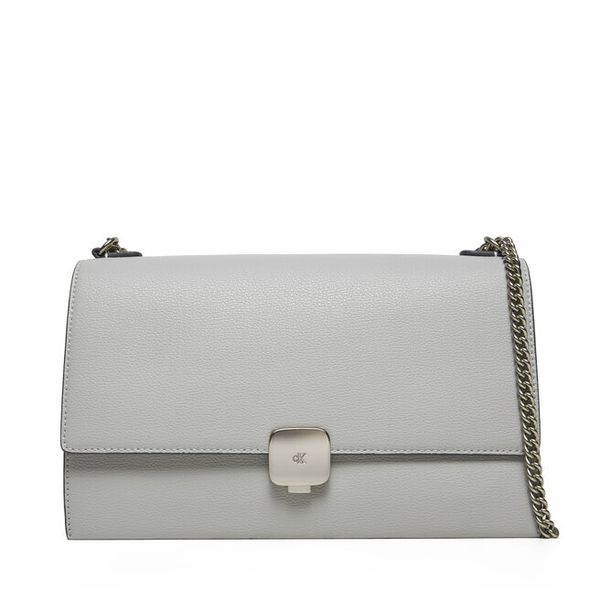 Torebka Calvin Klein Jeans. Szare torebki klasyczne damskie Calvin Klein Jeans, bez wzorów, z jeansu, wizytowe, bez kołnierzyka, bez ramiączek. Za 329.99 zł.