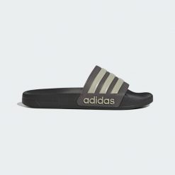Klapki męskie basenowe Adidas ADILETTE. Szare klapki i japonki męskie Adidas, z materiału. Za 129.99 zł.