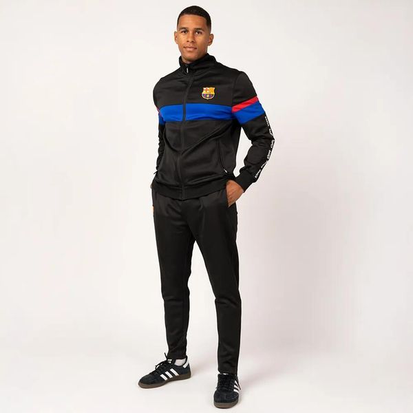 Dres piłkarski dla dorosłych FC Barcelona 24/25. Czarne spodnie dresowe damskie FC Barcelona, xl, bez wzorów, z dresówki. W wyprzedaży za 398.84 zł.