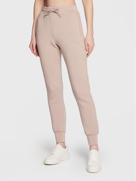 Guess Spodnie dresowe Allie Scuba V2YB18 K7UW2 Beżowy Regular Fit. Brązowe spodnie dresowe damskie Guess, xl, z aplikacjami, z dresówki. Za 365.00 zł.
