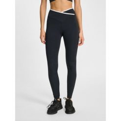 Damskie legginsy z wysokim stanem Hummel Wrap. Czarne legginsy sportowe damskie HUMMEL, bez wzorów, z podwyższonym stanem, na fitness i siłownię. Za 236.50 zł.