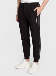 Guess Spodnie dresowe Mickey Z2YB09 KB3P2 Czarny Regular Fit. Czarne spodnie dresowe męskie Guess, z aplikacjami, z dresówki. Za 429.99 zł.