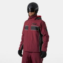 Kurtka narciarska Helly Hansen ULLR D 2.0. Czerwone kurtki damskie Helly Hansen, na zimę, bez wzorów, bez kaptura. Za 1,141.50 zł.