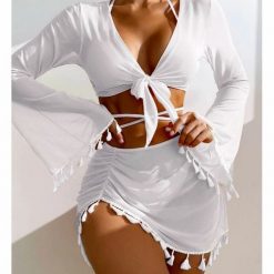 Komplet bikini z pareo i wielofunkcyjnym topem na plażę Maili. Czarne bikini damskie Intica, bez wzorów. Za 149.00 zł.