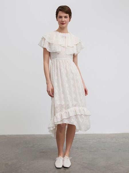 BGN Sukienka w kolorze kremowym rozmiar: 34. Brązowe sukienki damskie BGN, na imprezę, bez wzorów, bez kołnierzyka, bez ramiączek, midi. Za 109.52 zł.