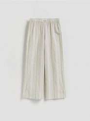 Piżamowe spodnie - jasnozielony. Zielone spodnie materiałowe damskie Reserved, bez wzorów, z bawełny. Za 59.99 zł.