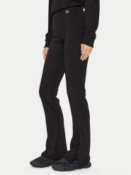 Hugo Spodnie materiałowe Naessa 50517459 Czarny Slim Fit. Czarne spodnie materiałowe damskie Hugo, bez wzorów, z materiału. Za 379.99 zł.