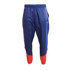 Spodnie sportowe męskie Nike DX0653410. Niebieskie spodnie dresowe męskie Nike, bez wzorów, z dresówki. W wyprzedaży za 264.70 zł.