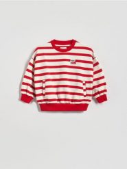 Bawełniana bluza w paski - czerwony. Czerwone bluzy i bluzki niemowlęce Reserved, bez wzorów, z bawełny, bez ramiączek, bez kaptura. Za 49.99 zł.
