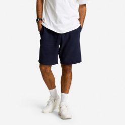 Spodenki fitness męskie Domyos. Niebieskie szorty męskie DOMYOS, l, z materiału, na fitness i siłownię. Za 69.99 zł.