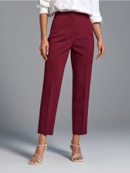 Spodnie cygaretki - bordowy. Czerwone spodnie materiałowe damskie Sinsay, bez wzorów, z podwyższonym stanem. Za 49.99 zł.