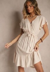 Beżowa Kopertowa Sukienka z Wiskozy Ozdobiona Paskiem Lanestea. Brązowe sukienki damskie Renee, na co dzień, l, z aplikacjami, z wiskozy, eleganckie, bez kołnierzyka, bez ramiączek, midi, kopertowe. W wyprzedaży za 45.49 zł.