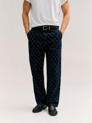 Guess Jeansy Damon M6YAV7 D1290 Granatowy Relaxed Fit. Niebieskie jeansy męskie Guess. Za 552.99 zł.