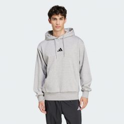 Bluza polarowa Essentials Feelcozy. Czarne bluzy z kapturem męskie Adidas, s, z bawełny. Za 219.00 zł.