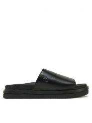 Calvin Klein Jeans Klapki Flat Molded Sandal Slide YW0YW01710 Czarny. Czarne klapki damskie Calvin Klein Jeans, bez wzorów, z jeansu, bez obcasa. Za 309.99 zł.