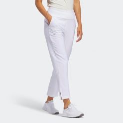 Spodnie do golfa damskie ADIDAS. Niebieskie spodnie materiałowe damskie Adidas, bez wzorów, z materiału, wakacyjne, z podwyższonym stanem. Za 309.99 zł.