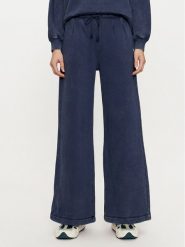 Deha Spodnie dresowe C12175 Granatowy Relaxed Fit. Niebieskie spodnie dresowe damskie Deha, m, bez wzorów, z bawełny. Za 609.99 zł.